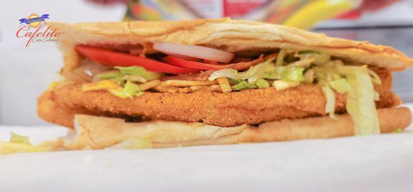 Fried fish fillet, tomato, sautéed onions, lettuce, tartar sauce