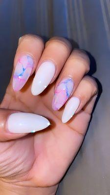 I asked for marble color- blue ,pink and purple with base coat milky white - gel acrylic almond shape nails .