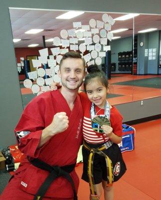 Brianna proud of her instructor, Mr. Kafer for winning Gold at the World Championship in Arkansas!