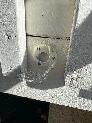 Broken security camera they tried to disguise by taping it back up with packing tape