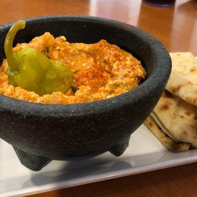 Feisty Feta Dip, served with pita bread.