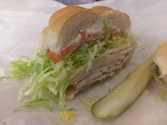 Homemade turkey on a hard roll with lettuce, tomatoes, provolone. Pickle on the side. $7.15