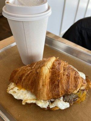 Sausage egg and cheese on a croissant