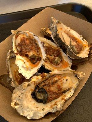 Grilled oysters with garlic barbecue sauce. Photo by @martiwantsmore