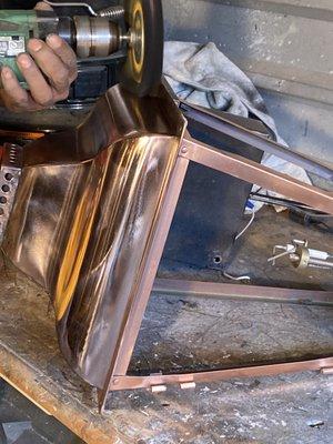 Final polishing of copper exterior porch lights