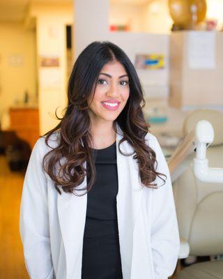 Midtown Dental Care Dr. Randhawa smiling headshot