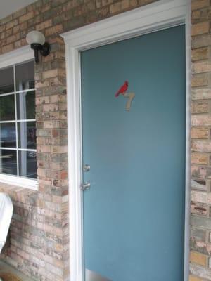 Cardinal theme on each hotel room door