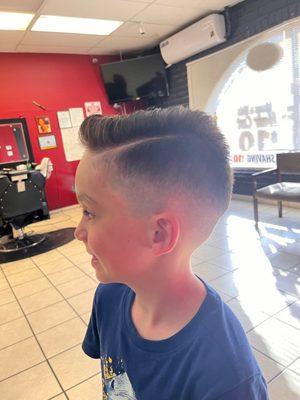 Fade with hard part and styling on 6 year old