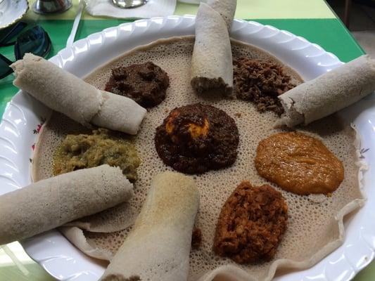 3-Meat combination platter with two vegetable selections (lentils and peas)