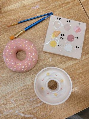 Pink sprinkled donut ceramic before firing and glazing