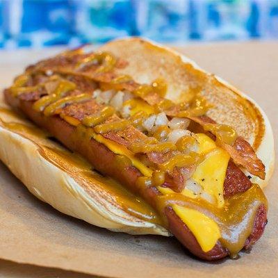 WAYBACK DOG Yellow American Cheese, Bacon, Grilled Onions, Wayback Gold Sauce