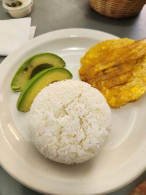 This side dish came with the soup of the day and it includes avocado slices, some plantains, rice, and cream on the side.