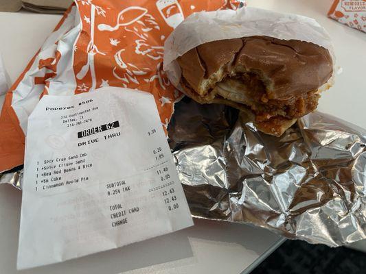 Just picked up my lunch and this is what I found when I opened the bag.  Chicken sandwich had a bite out of it!!! Popeyes #586