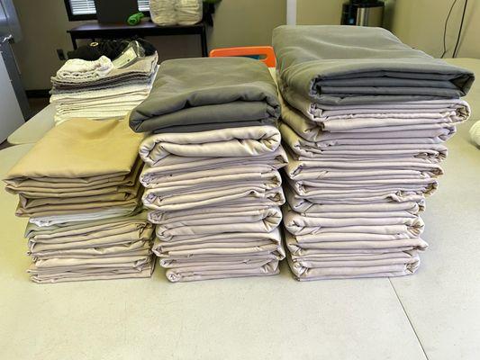 We specialize in massage sheets & salon towels. Options to flat stack hand towels at a discounted rate.