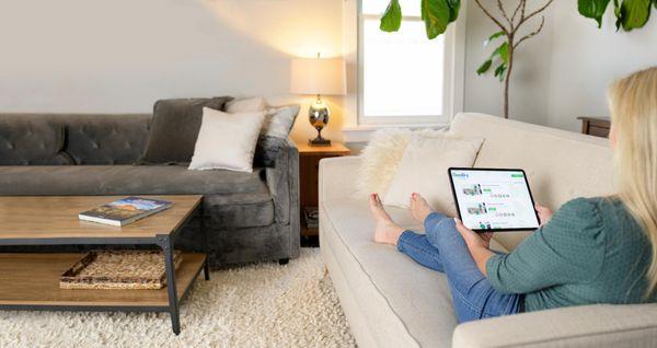 Woman sitting on clean furniture in Yukon