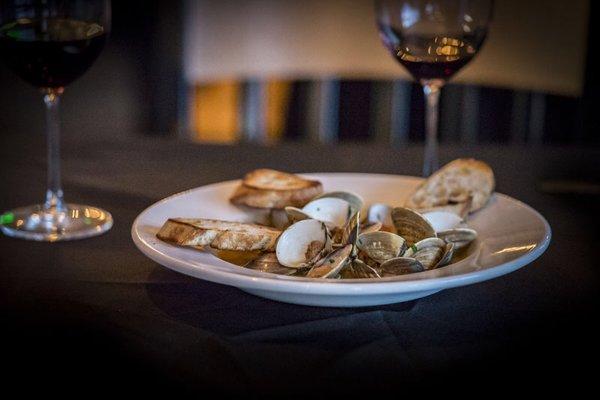 Steamer clams are one of our favorites: clams, Spanish chorizo, tomato, garlic, beer and toast points!