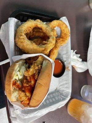 Buffalo chicken sandwich with gourmet onion rings