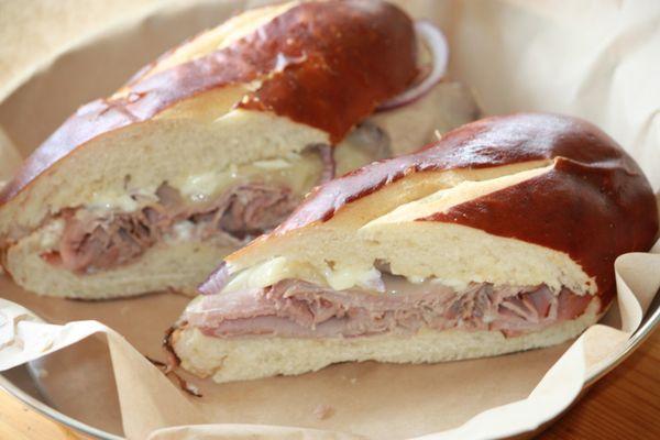 Roast beef on pretzel bread