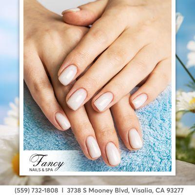 Short nails, big style! Discover our chic collection at Fancy Nails Salon.  #ShortNailStyle #NailPerfection"