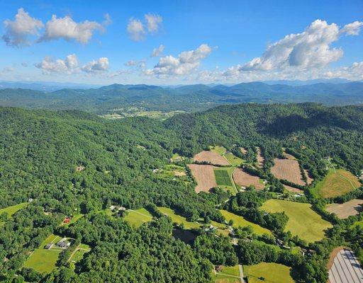 Bill and Rebecca Lewis of Vero Beach, Florida, enjoying a helicopter tour of the Smoky Mountains over Asheville, North Carolina.