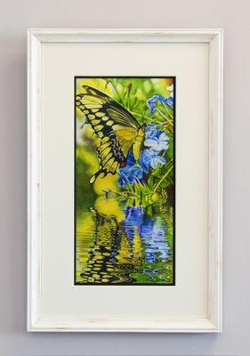 We frame originals and reproductions. Giclee reproductions crested in-house.