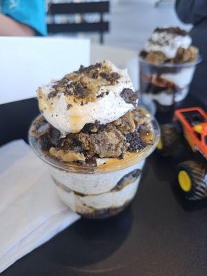 Caramel, cookie, oreo, homemade whipped cream.