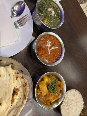 Palak paneer, chicken tikka masala, cauliflower/potatoes, rice and naan.