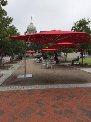 Seating area with umbrellas.