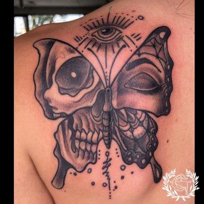 Skull/Butterfly tattoo by Guillotine