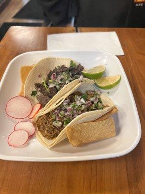 Grilled steak taco and shredded chicken with mole taco