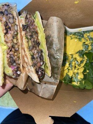 black bean burger and turmeric ginger dressing on a bed of salad