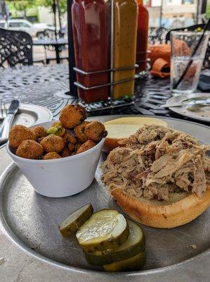 Pulled pork sandwich ($9.50) with fried okra