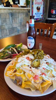 Cabeza tacos, and cabeza mix nachos.