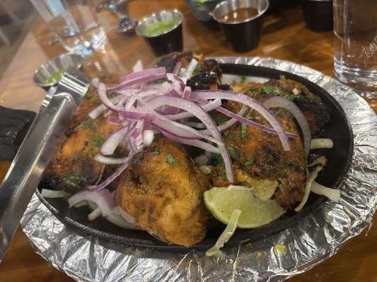 Tandoori chicken still sizzling