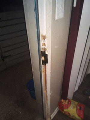 The door jamb of my apartment that was kicked in and robbed about 2 months ago and has not been fixed sense!!!