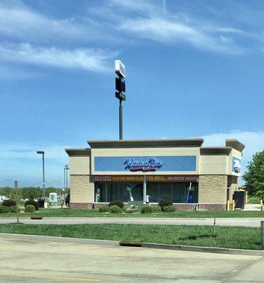 The drive-thru carwash is across the street.