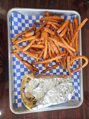 Gyro and sweet potato fries. It is a very good meaty gyro.