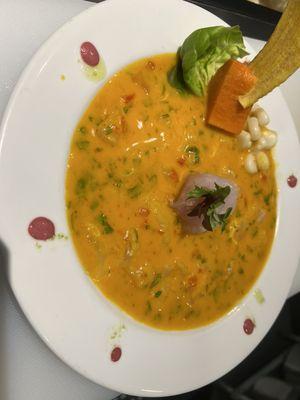 fish tiradito in Peruvian yellow chili