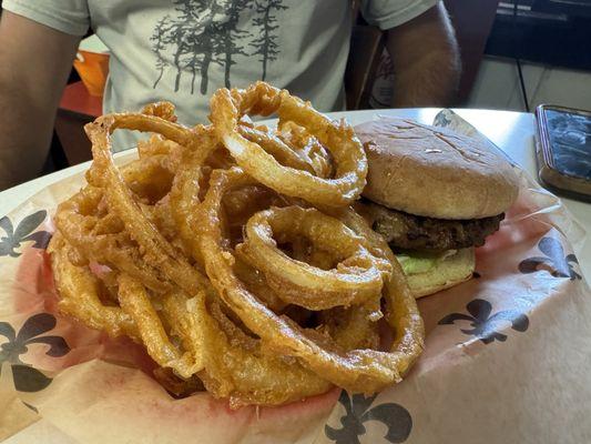 Alligator burger and onion rings.