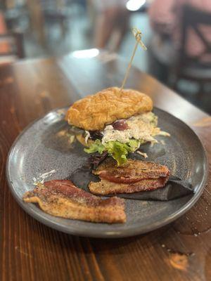 Chicken Croissant sandwich with a rasher of peppered bacon