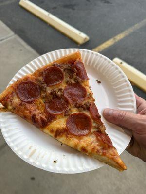 Pepperoni and sausage slice