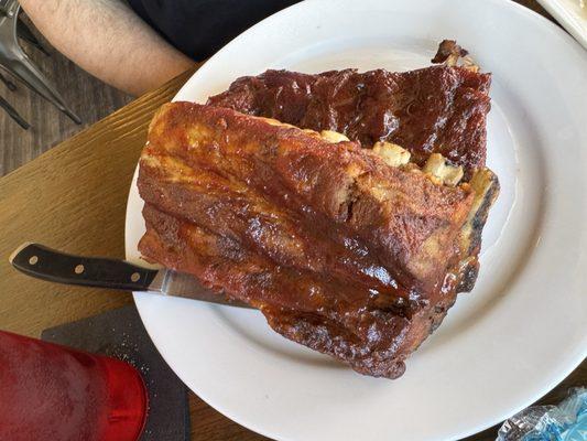 Full rack of Baby-backs ( comes with 2 sides)