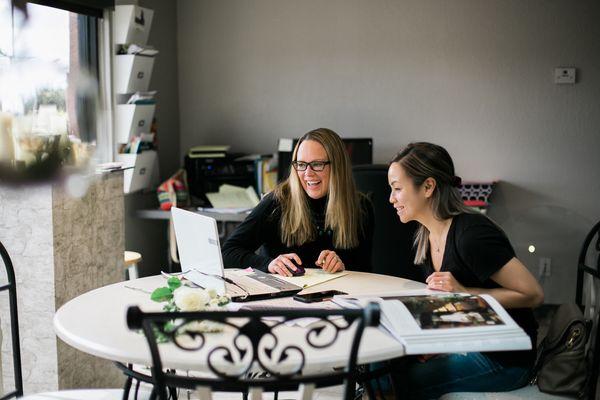 Jana consulting with one of our amazing brides