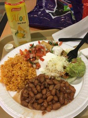 Three rolled tacos combo w/ Spanish rice & whole beans !