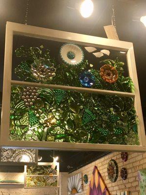 Loved this piece. Broken glass recycled into an art piece.