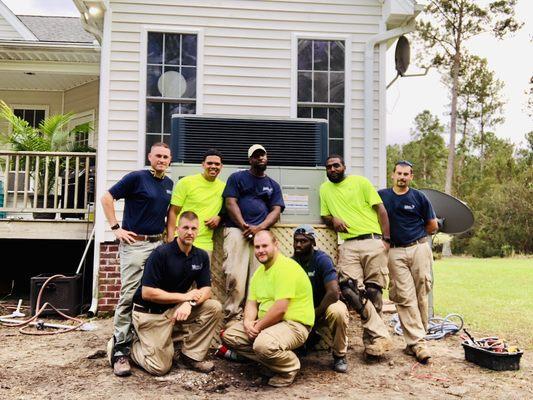 This is a group picture after finishing an install for a customer that is recovering from Hurricane Florence.