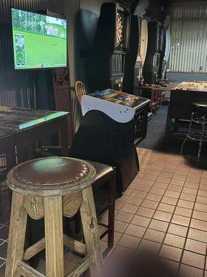 Golden tee game and three dart boards