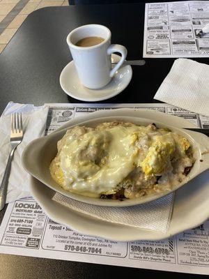 Biscuits, scrambled eggs, peppers, onions, home fries, American cheese, sausage gravy en casserole, This is a fantastic special ‍