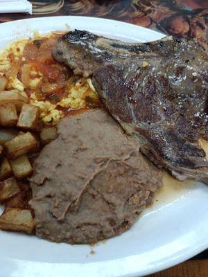 Huevos ranchero with steak