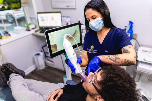 Shore Smiles Dental staff and patient